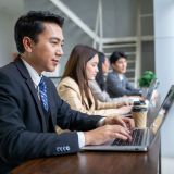 portrait-of-asian-middle-age-businessman-working-at-the-office-e1706204346133.jpg